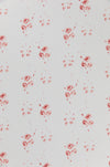 Red floral pattern on a light gray background