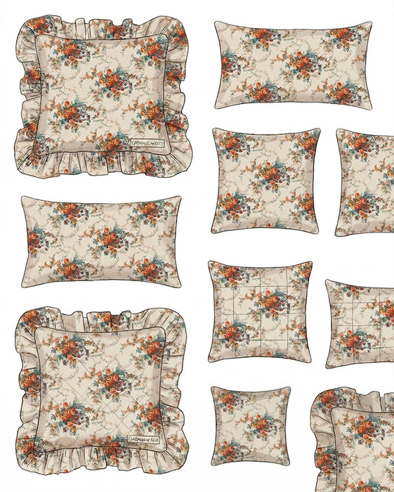 Set of floral patterned pillows with ruffled edges on a white background