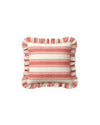 Striped pillow with ruffle trim on a white background
