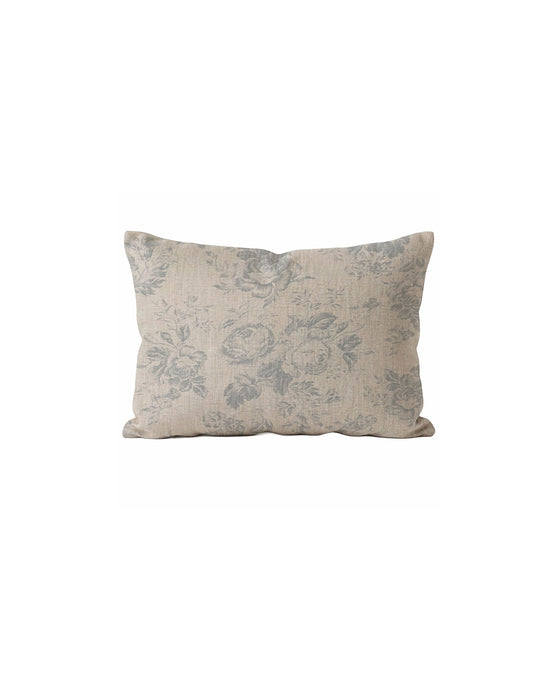 Decorative pillow with floral pattern on a white background