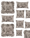 Set of decorative pillows with floral patterns on a white background