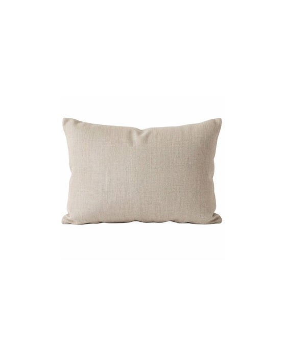 Beige pillow on a white background