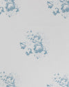 A patterned fabric with blue floral motifs on a white background.