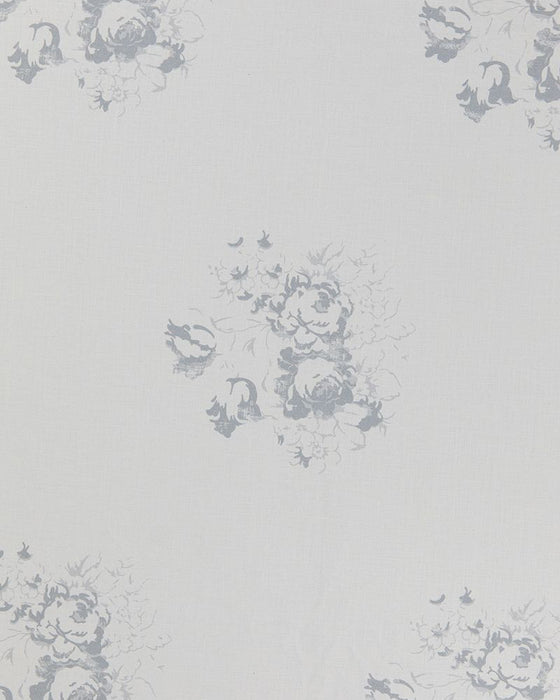A sheet of white linen with a faded floral motif in a subtle blue tone.