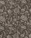 A close-up image of a fabric with a floral toile pattern in a charcoal gray color on a natural linen background.
