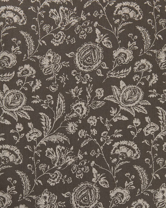A close-up image of a fabric with a floral toile pattern in a charcoal gray color on a natural linen background.