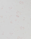 A close-up image of a fabric with a floral pattern consisting of small, pale pink roses printed on a white linen background.