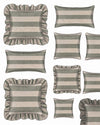 Set of decorative pillows with striped patterns on a white background