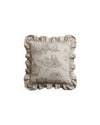 Decorative pillow with ruffled edge and intricate pattern on a white background