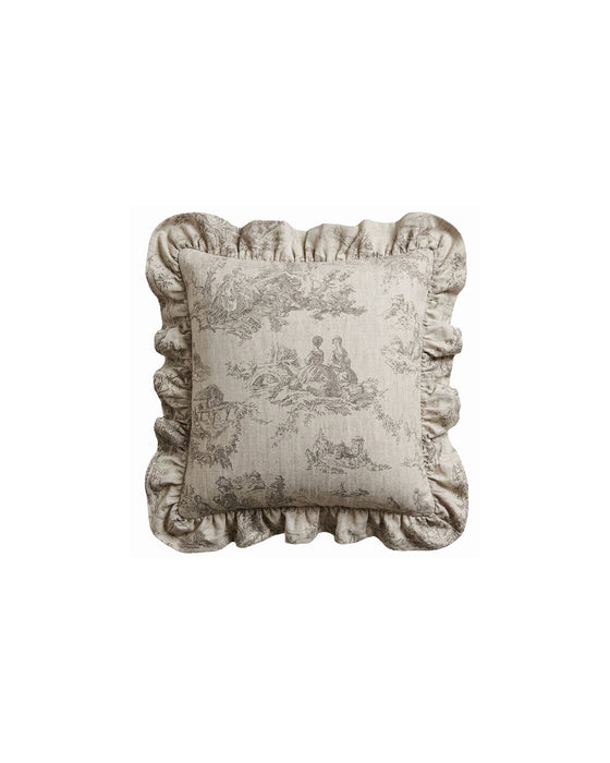 Decorative pillow with ruffled edge and intricate pattern on a white background