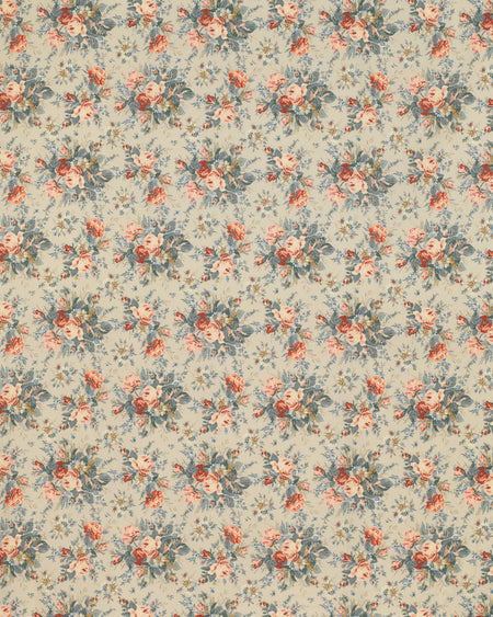 Floral patterned fabric with small flowers on a beige background