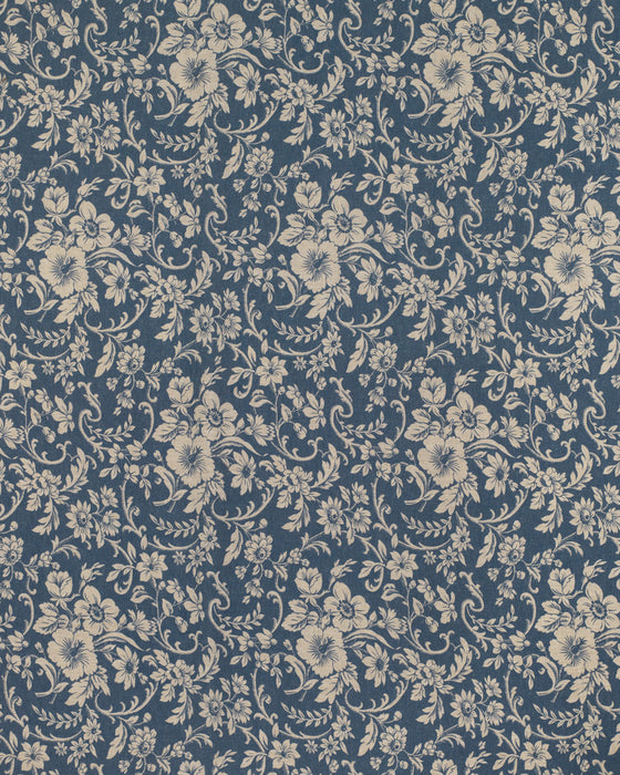 Floral patterned fabric with beige flowers on a blue background