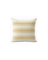 Striped pillow with yellow and white stripes on a white background
