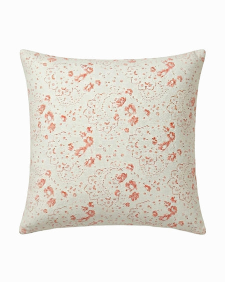 Floral patterned pillow on a white background